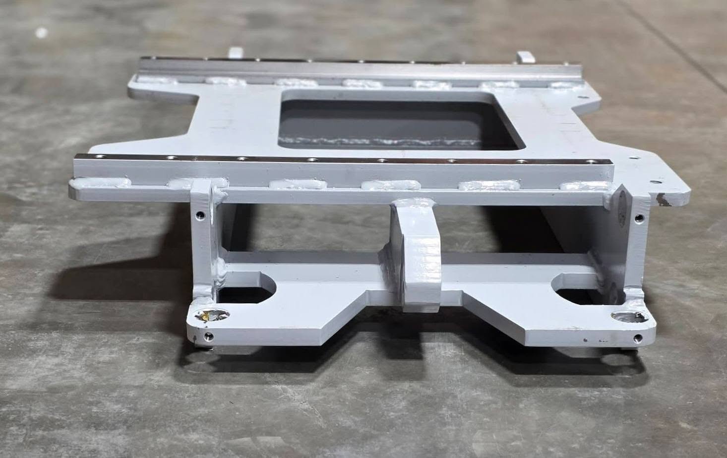 The Slabback Assembly T450W, WS (Part Number: 10-3660-0016F), replacement structural component used on Schramm T450W and T450WS rotary and reverse-circulation drilling rigs